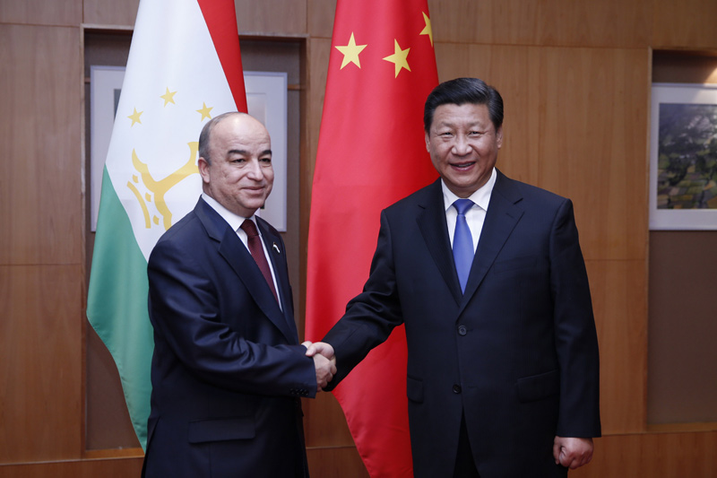 9月13日，國家主席習近平在杜尚別會見塔吉克斯坦議會下院議長祖胡羅夫。 新華社記者鞠鵬攝