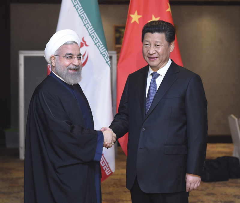 4月23日，國(guó)家主席習(xí)近平在雅加達(dá)會(huì)見伊朗總統(tǒng)魯哈尼。新華社記者張鐸攝