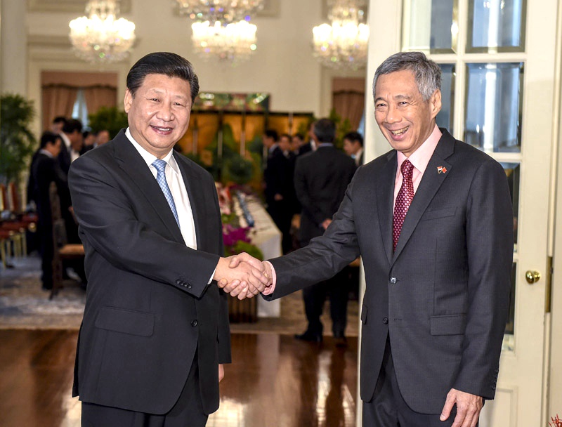 11月7日，中國國家主席習(xí)近平在新加坡會見新加坡總理李顯龍。新華社記者 李學(xué)仁 攝