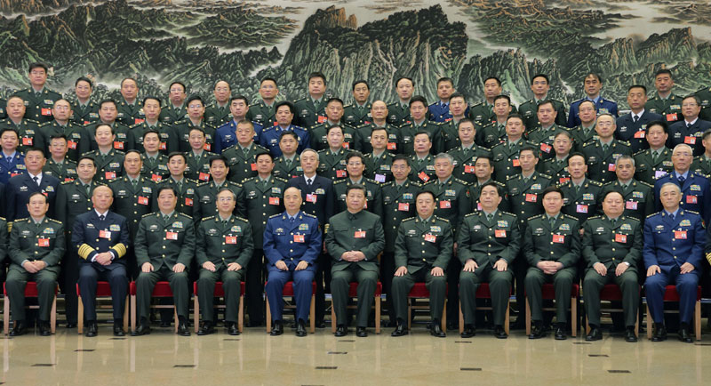 這是習(xí)近平親切接見會議代表，同大家合影留念。新華社記者 李剛 攝