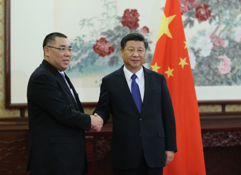 12月23日，國家主席習近平在中南海會見了來京述職的澳門特別行政區(qū)行政長官崔世安。新華社記者 蘭紅光 攝