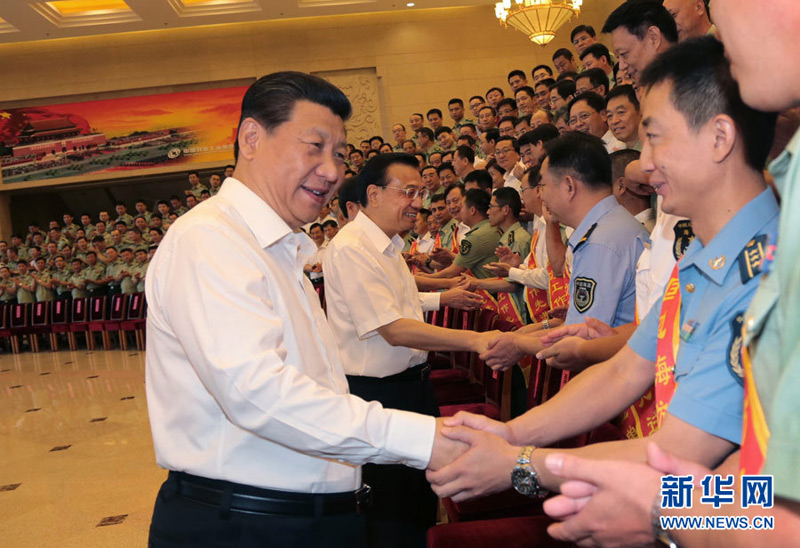 2014年6月27日，習(xí)近平、李克強(qiáng)、張高麗等在北京接見第五次全國邊海防工作會(huì)議全體與會(huì)代表。 李剛 攝