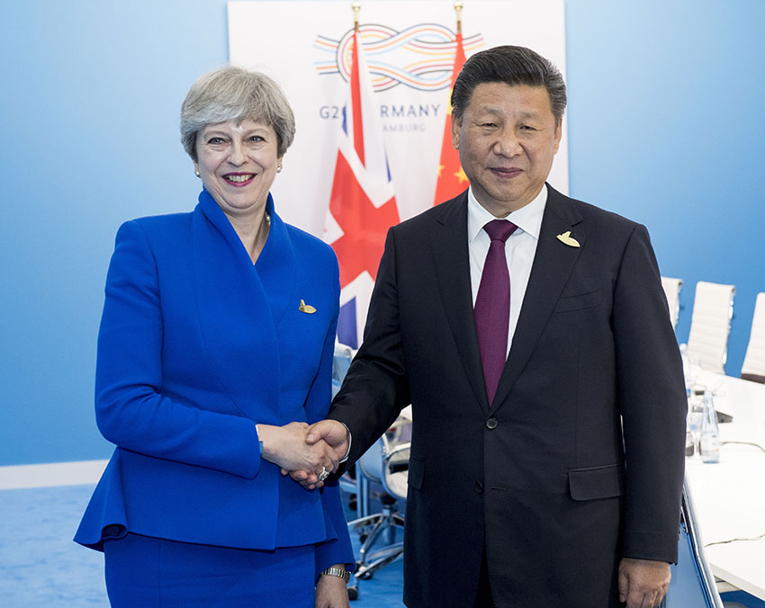 7月7日，國(guó)家主席習(xí)近平在漢堡會(huì)見英國(guó)首相特雷莎·梅。 新華社記者李學(xué)仁 攝