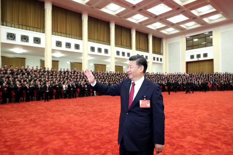 10月25日下午，中共中央總書記、國家主席、中央軍委主席習近平等領導同志在北京人民大會堂親切會見出席黨的十九大代表、特邀代表和列席人員。新華社記者 鞠鵬 攝