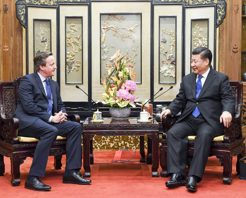 1月11日，國家主席習近平在北京釣魚臺國賓館會見英國前首相卡梅倫。新華社記者李學仁攝