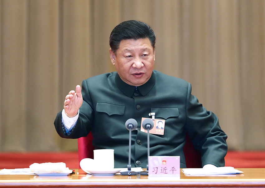 3月12日上午，中共中央總書記、國家主席、中央軍委主席習(xí)近平出席十三屆全國人大一次會議解放軍和武警部隊(duì)代表團(tuán)全體會議並發(fā)表重要講話。新華社記者 李剛 攝