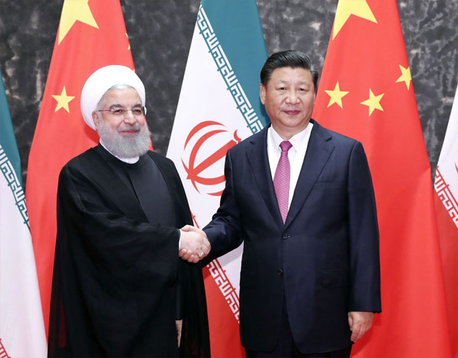 6月10日，國家主席習近平在青島同伊朗總統(tǒng)魯哈尼舉行會談。新華社記者 丁林 攝