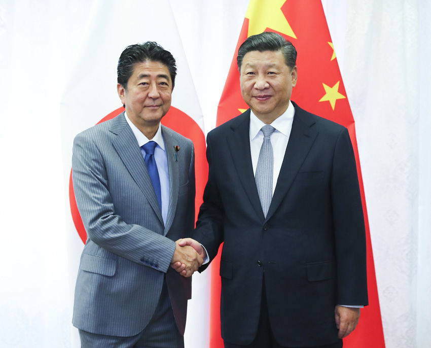 2018年9月12日，國家主席習近平在符拉迪沃斯托克會見日本首相安倍晉三。新華社記者 謝環(huán)馳 攝